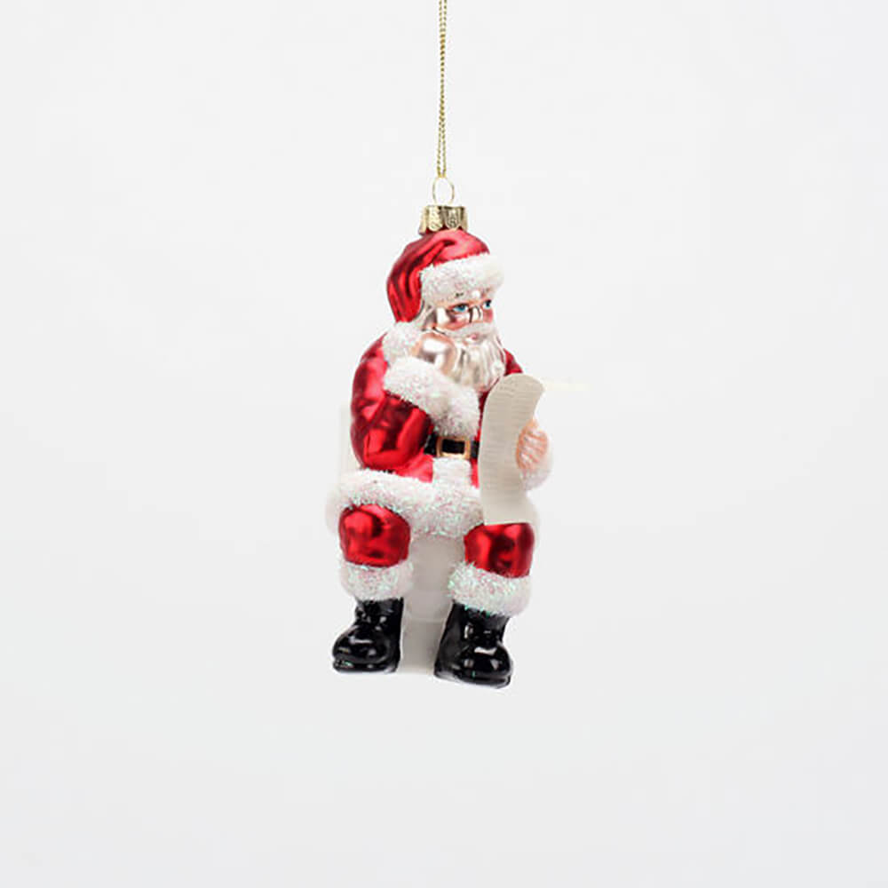 180-one-hundred-80-degrees-glass-north-poo-santa-christmas-ornament-sitting-on-toilet